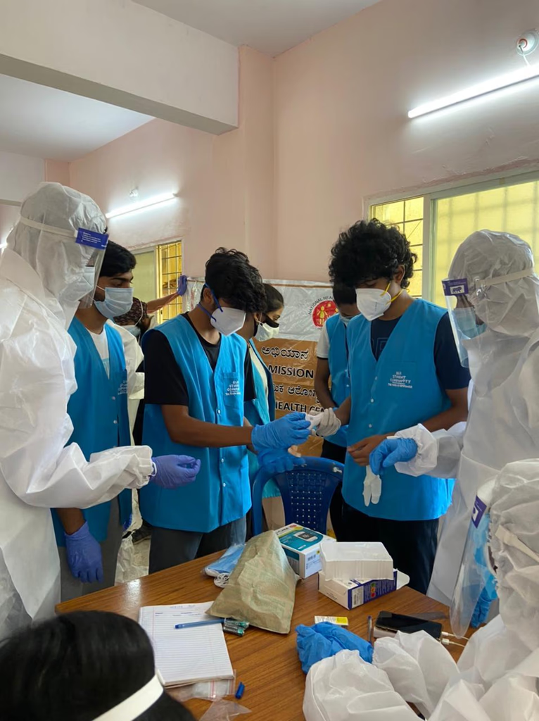 ISC student volunteers conducting a community healthcare initiative in India